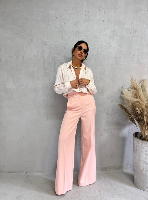 Zvonaste pantalone visokog struka u pastelnoj roze boji kosih džepova sa skrivenim rajsferšlusom