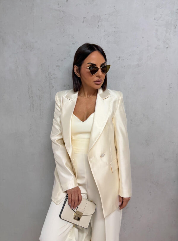 Elegantni beli svetlucavi ženski sako