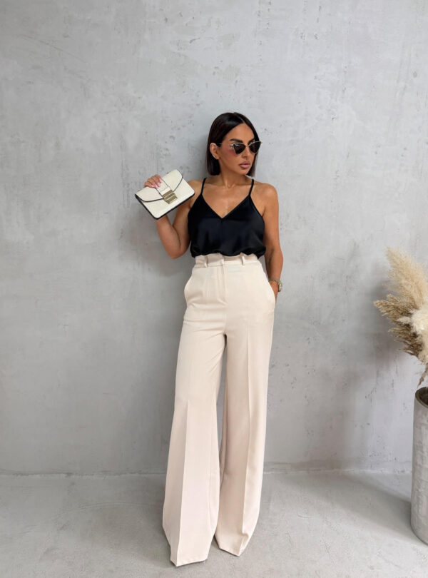 Prljavo bele zvonaste pantalone visokog struka kosih džepova sa skrivenim rajsferšlusom