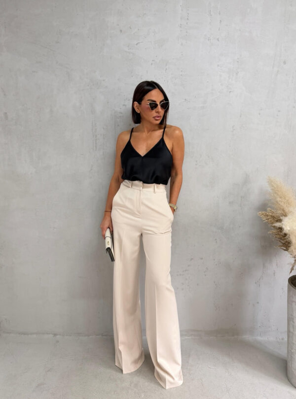 Prljavo bele zvonaste pantalone visokog struka kosih džepova sa skrivenim rajsferšlusom