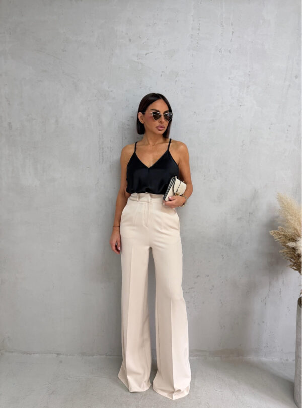 Prljavo bele zvonaste pantalone visokog struka kosih džepova sa skrivenim rajsferšlusom