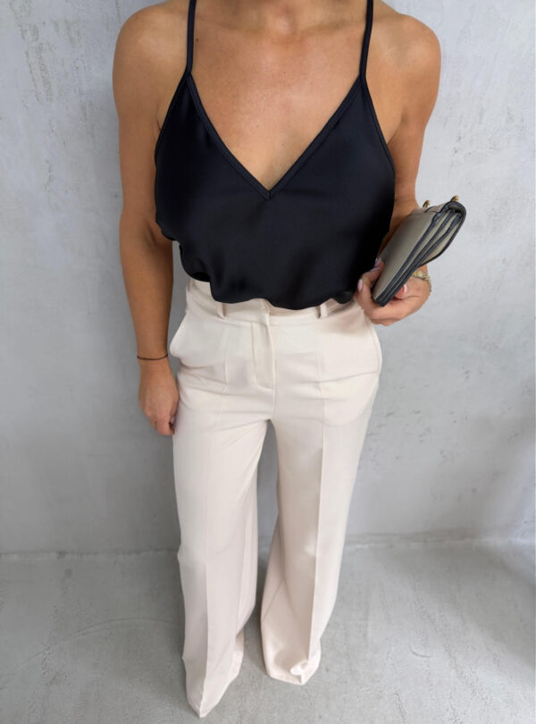 Prljavo bele zvonaste pantalone visokog struka kosih džepova sa skrivenim rajsferšlusom