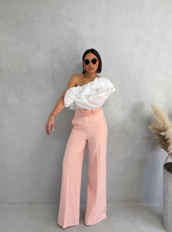 Zvonaste pastelno roze pantalone visokog struka kosih džepova sa skrivenim rajsferšlusom